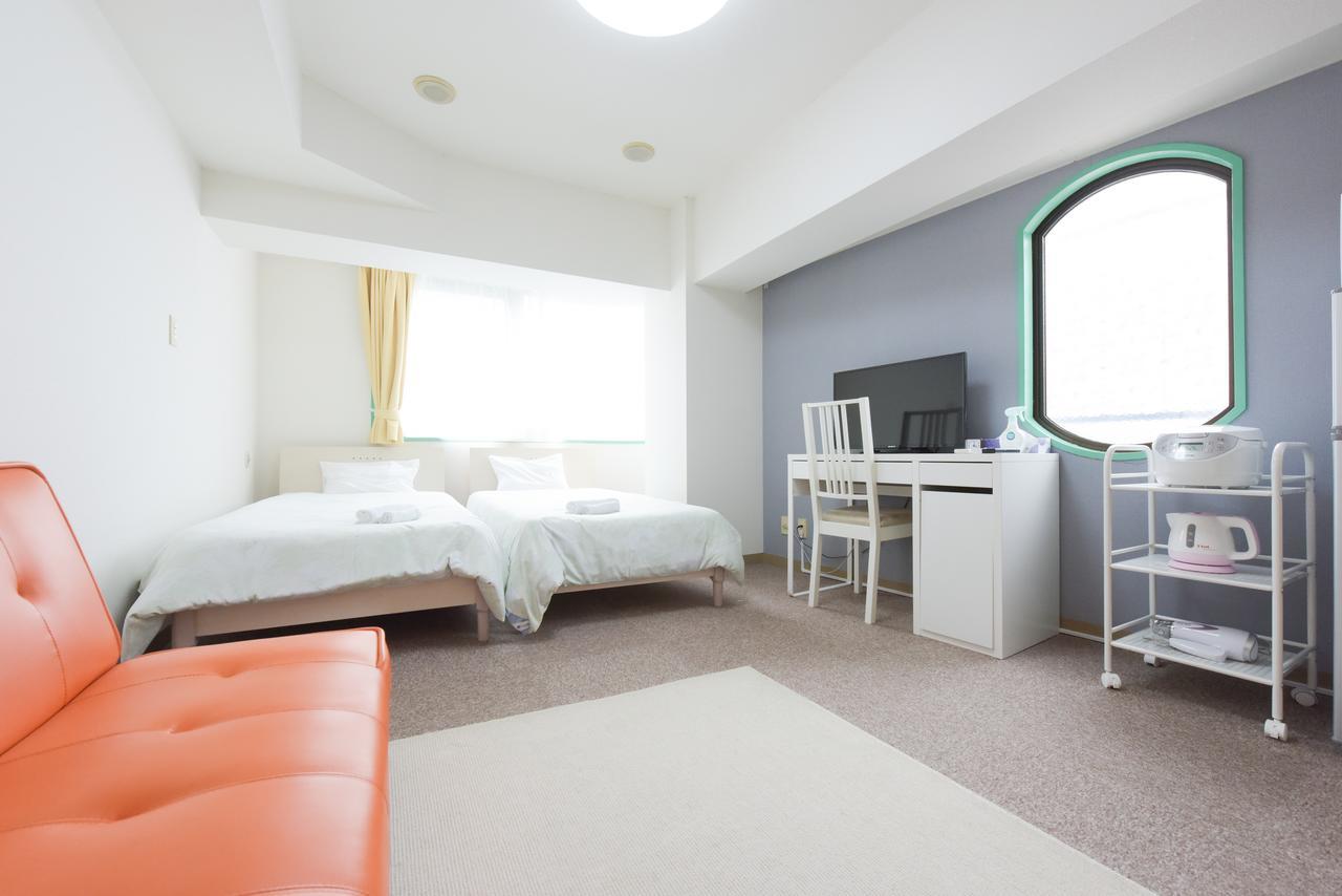 Hiroki Building Apartemen *