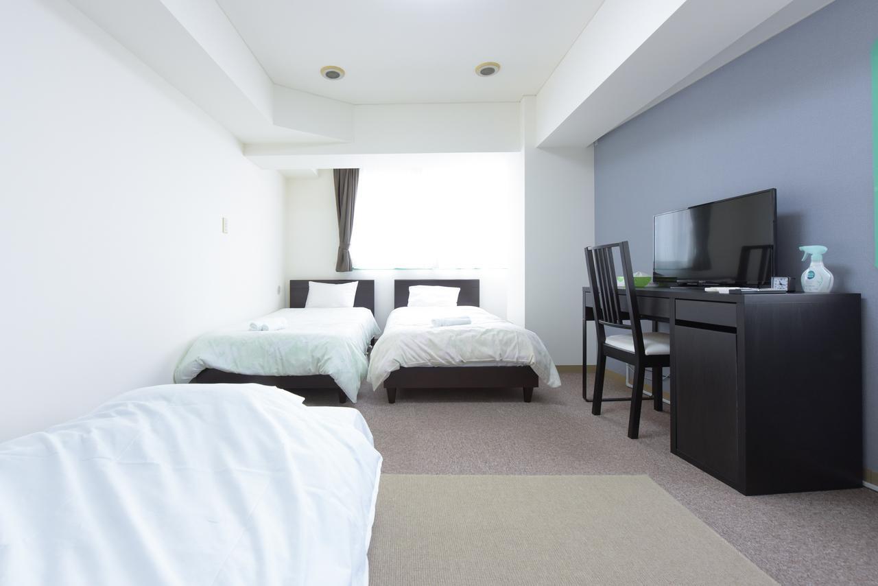 Hiroki Building Apartemen *